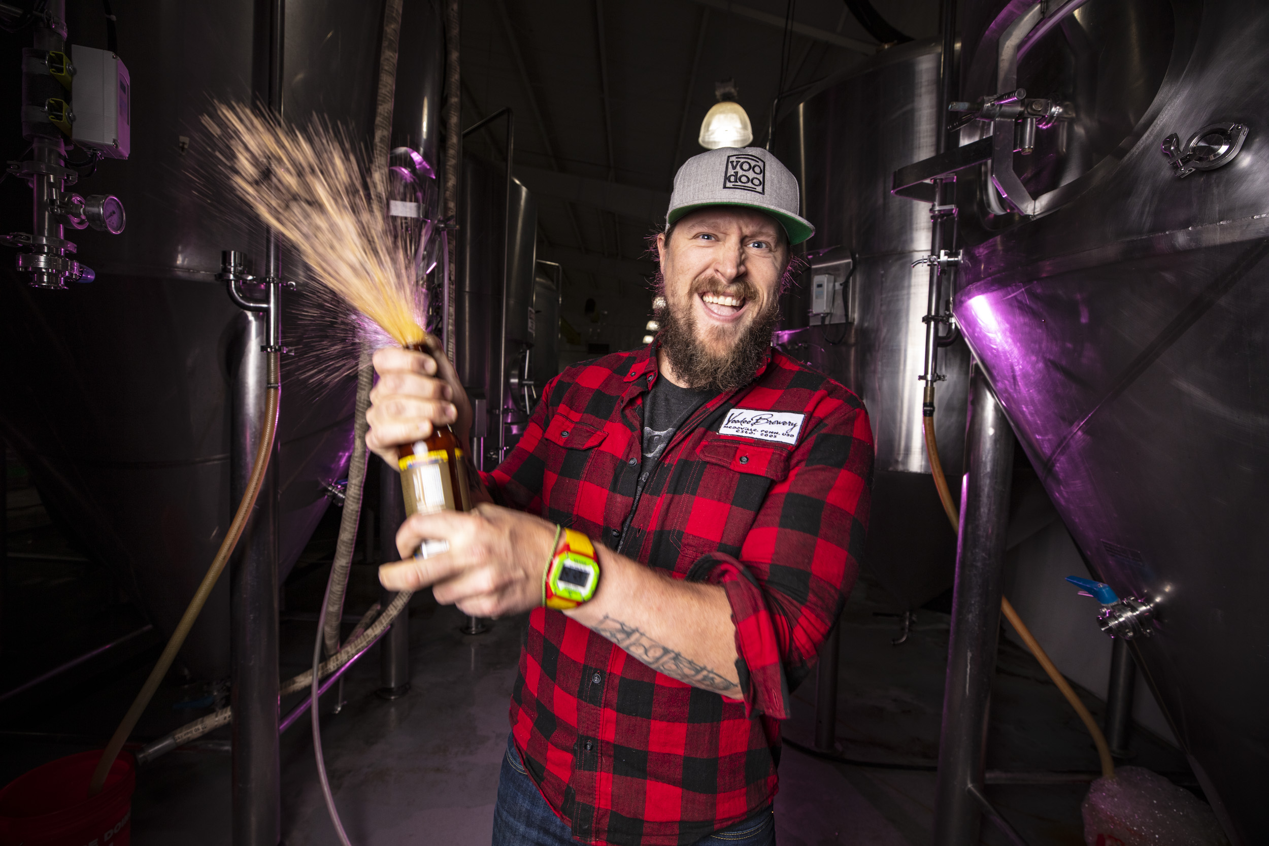 Environmental portrait of craft brewmaster at voodoo brewing