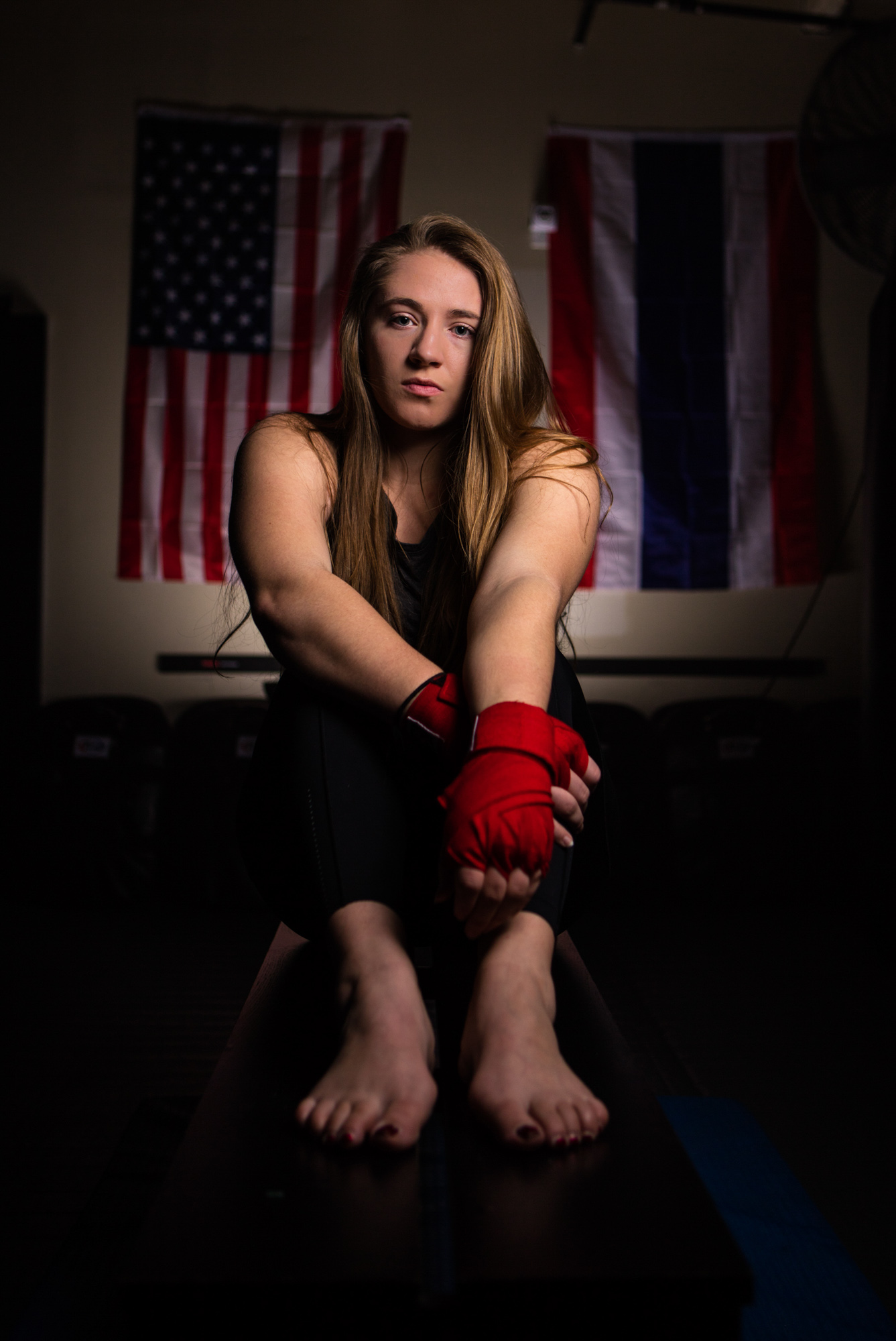 Active lifestyle portrait of girl kickboxer in gym in Boulder, Colorado.