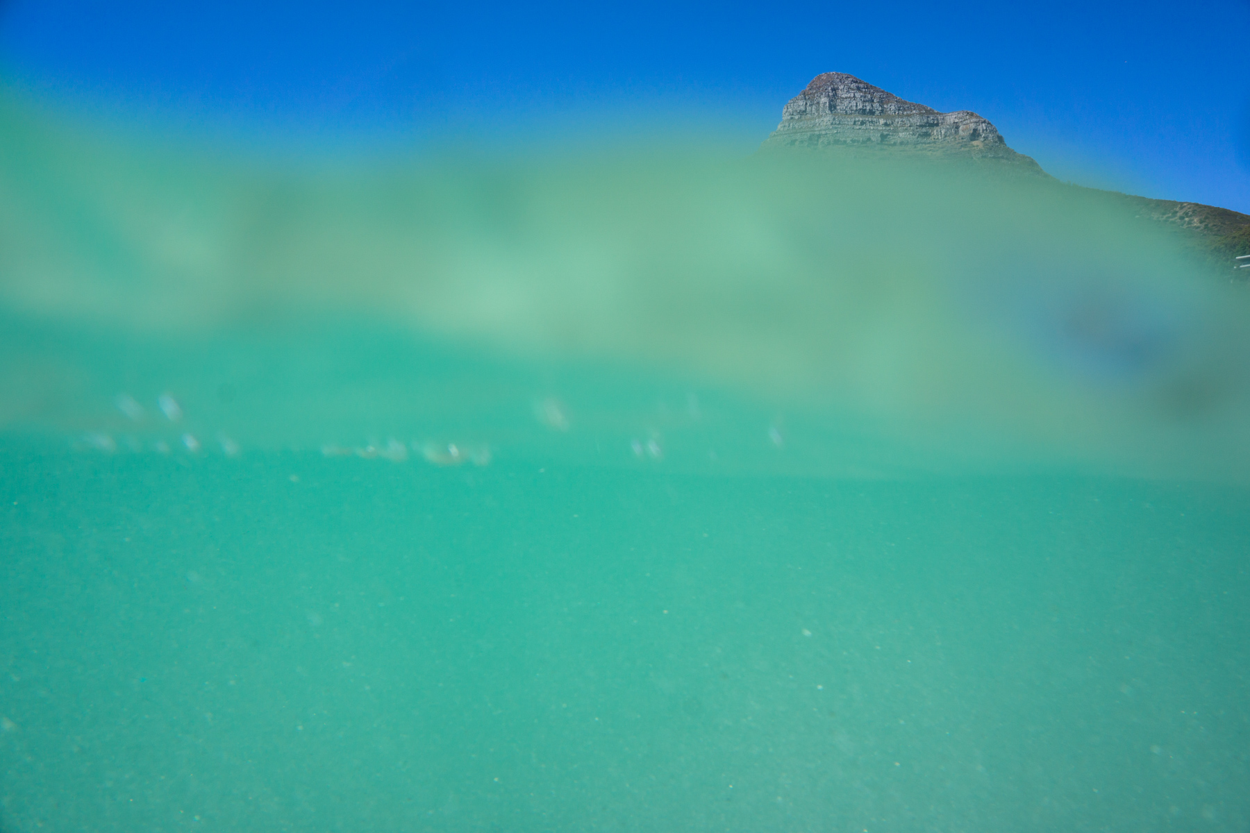 Lionshead mountain seen partially from underwater in Cape Town, South Africa.