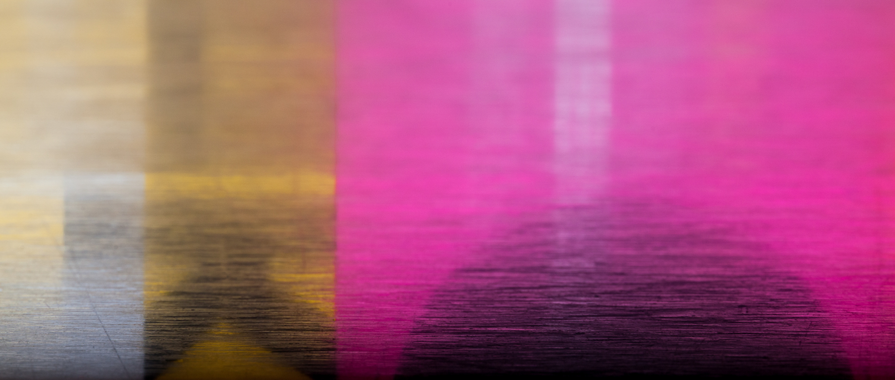 Macro Fine Art photo of colored pattern reflecting off a steel ruler.