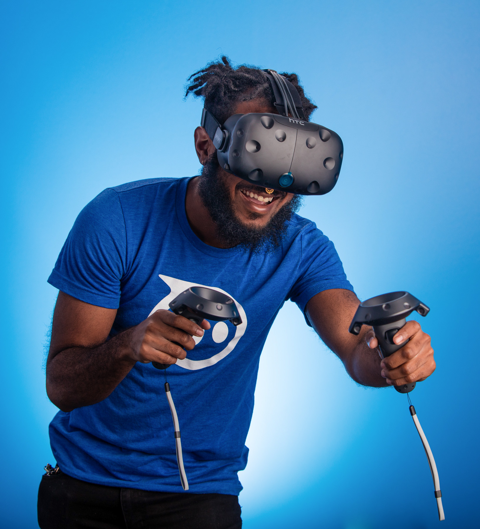 Studio portrait of man playing on Oculus Rift in Boulder, Colorado.
